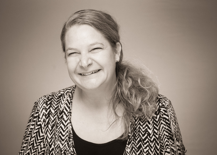 headshot of mature woman smilling
